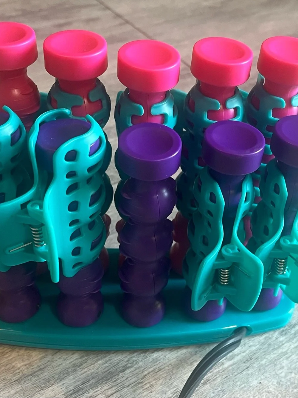 BedHead Purple Cosmetic Case with Teal and Pink Hair Rollers